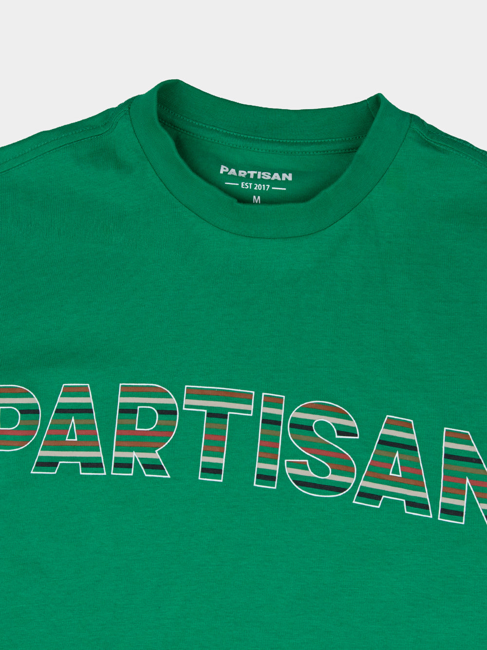 Partisan Stripe Print Tee in Staford Green – close-up of tonal stripe print logo detail by Partisan and Co