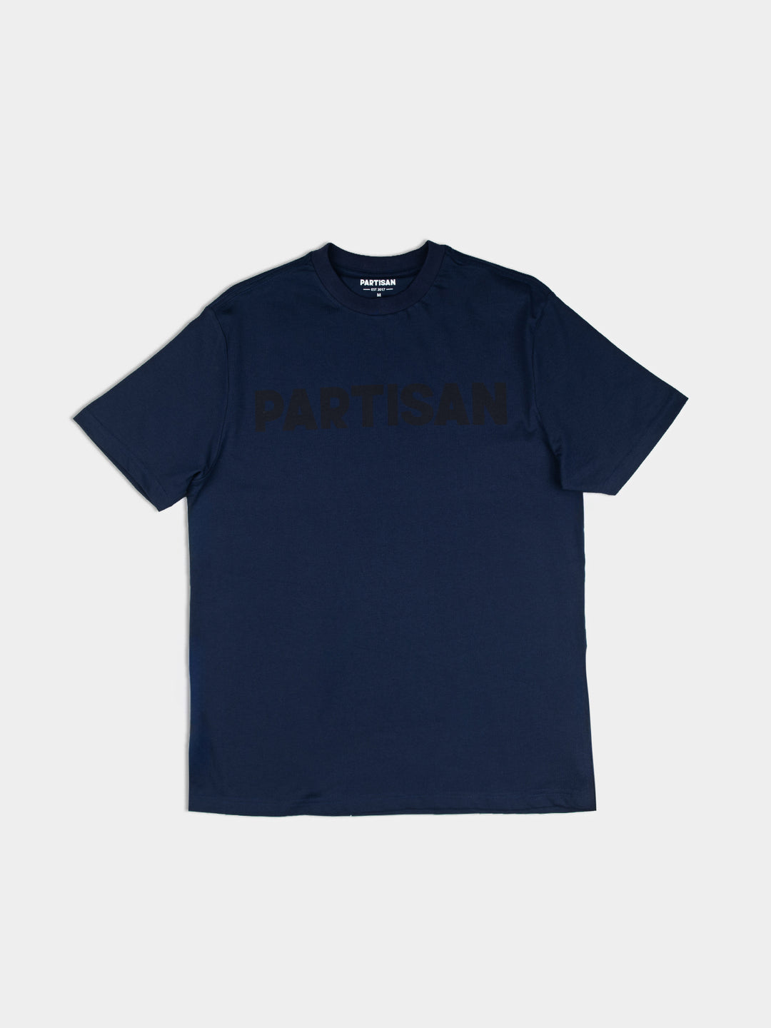 Partisan Tonal Print Tee in Navy – Men's navy blue graphic t-shirt with tonal Partisan logo, front view on white background