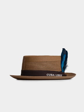 Cuba Libre Pork Pie Hat in Gold - flat crown, narrow brim, dark band and blue feather accent