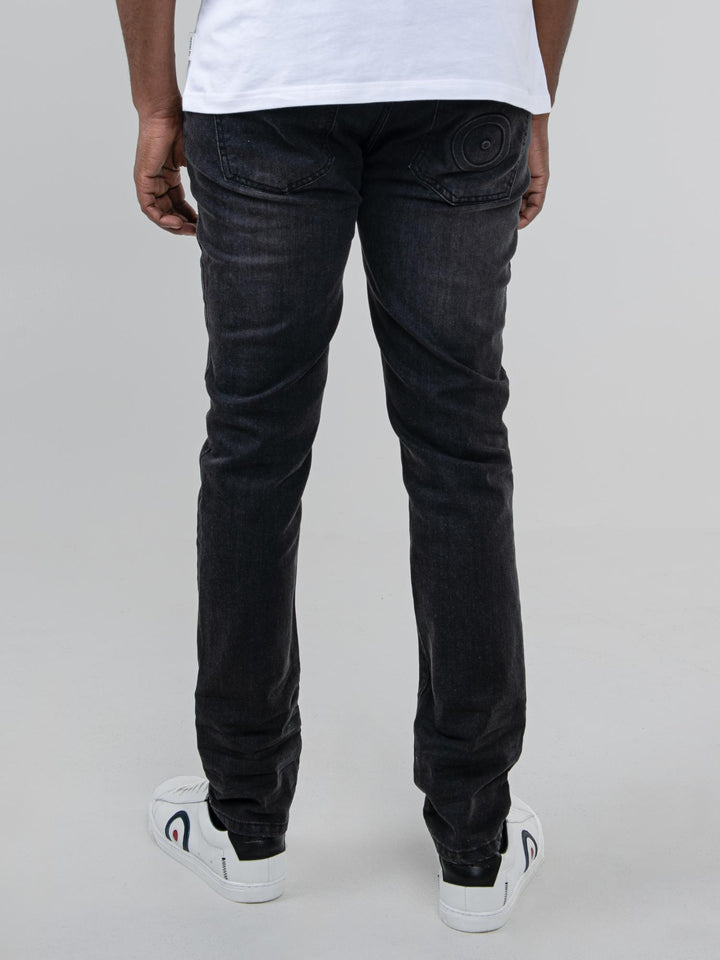 Ben Sherman Slim Fit Abrasion Denim Jeans in Black – back view with Mod target embroidery