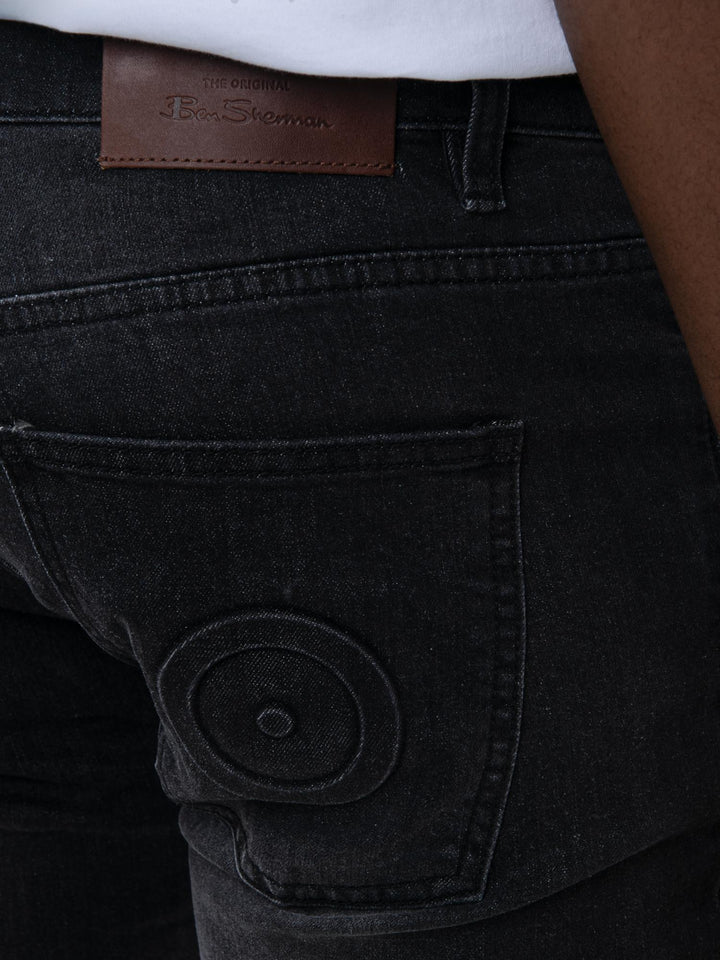 Ben Sherman Slim Fit Abrasion Denim – close-up of leather patch and Mod target embroidery on back pocket