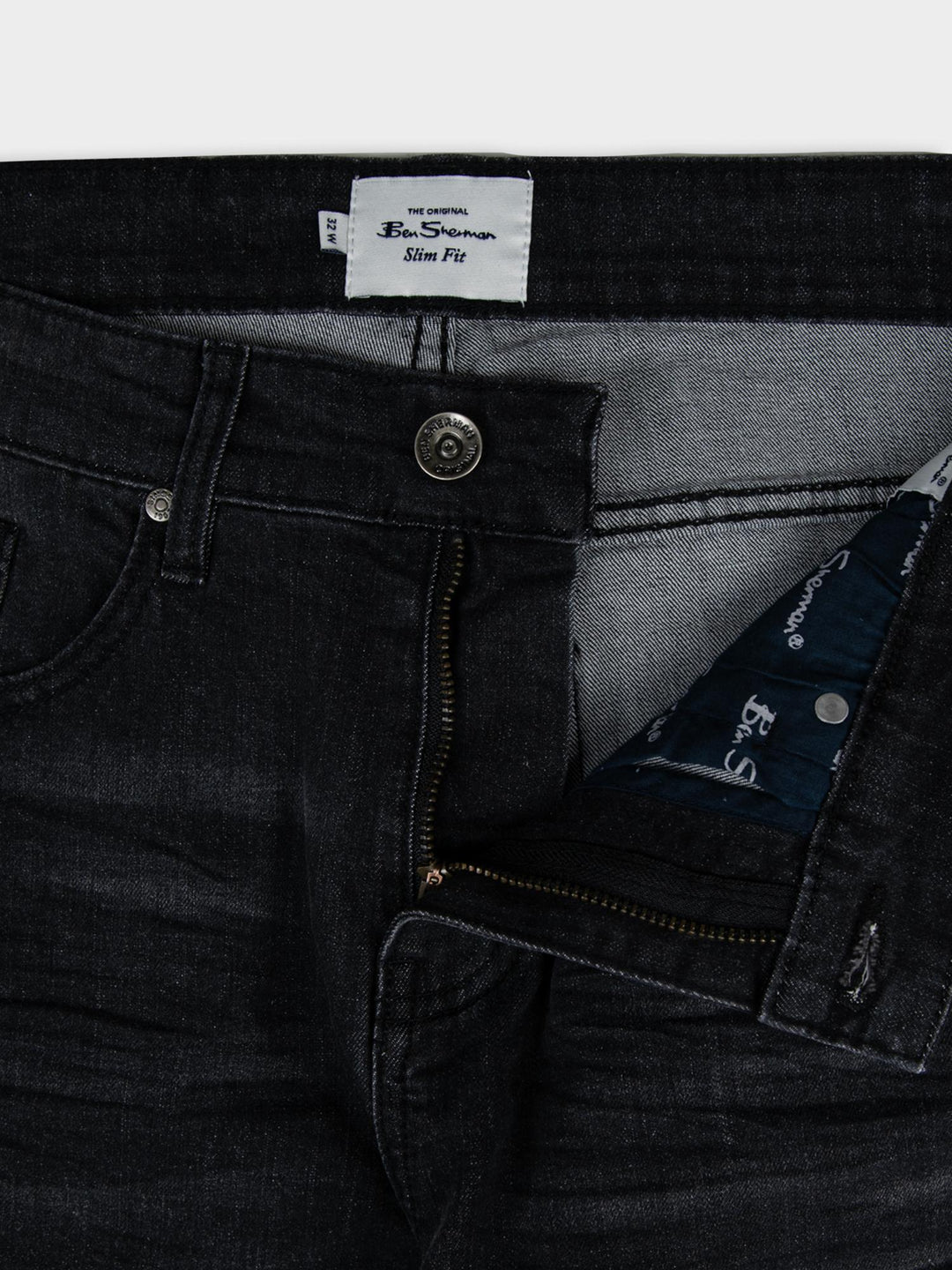 Ben Sherman Slim Fit Abrasion Denim – close-up of waistband with branded label and button detail