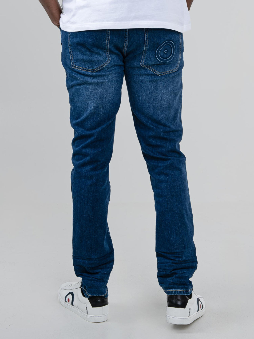 Ben Sherman Slim Fit Abrasion Denim Jeans in Dark Blue – back view with Mod target embroidery