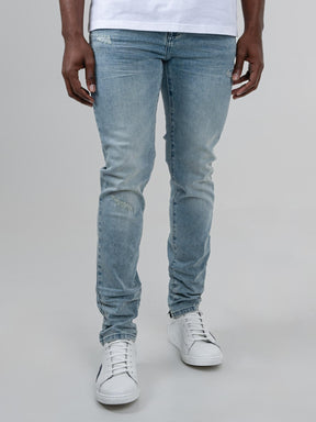 Ben Sherman Slim Fit Abrasion Denim Jeans in Light Blue – full length front view