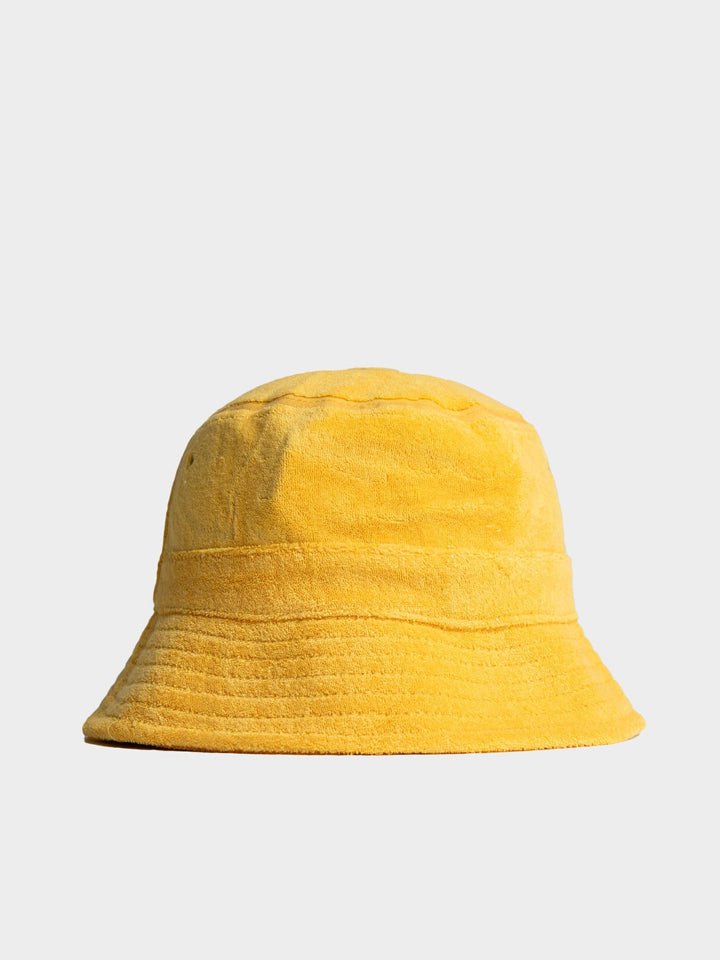 Ben Sherman Target Towelling Bucket Hat in Banana - soft yellow terrycloth bucket hat, side view showing structured brim