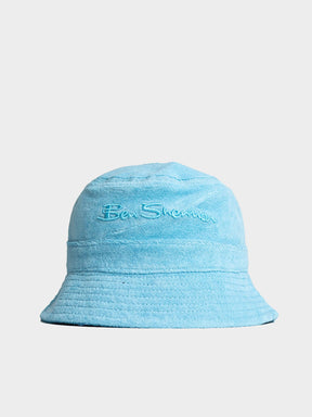 Ben Sherman Target Towelling Bucket Hat in Retro Blue - soft blue terrycloth bucket hat with embroidered Ben Sherman logo, front view