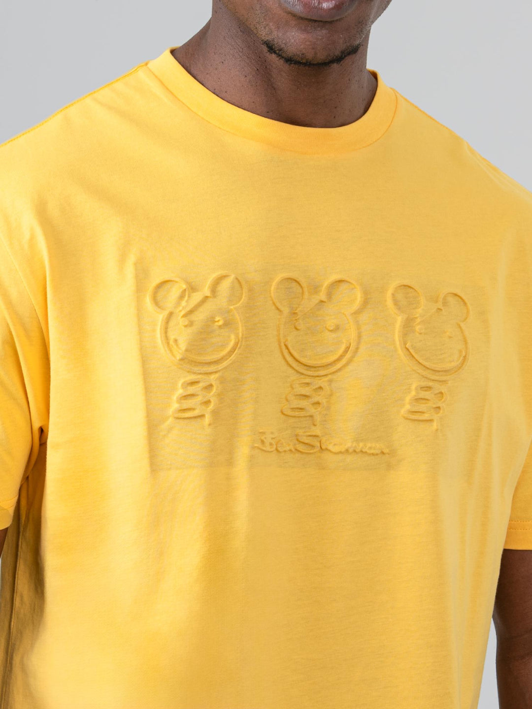 Close-up of three embossed bear graphics on Ben Sherman Trio Bears T-shirt in Banana yellow