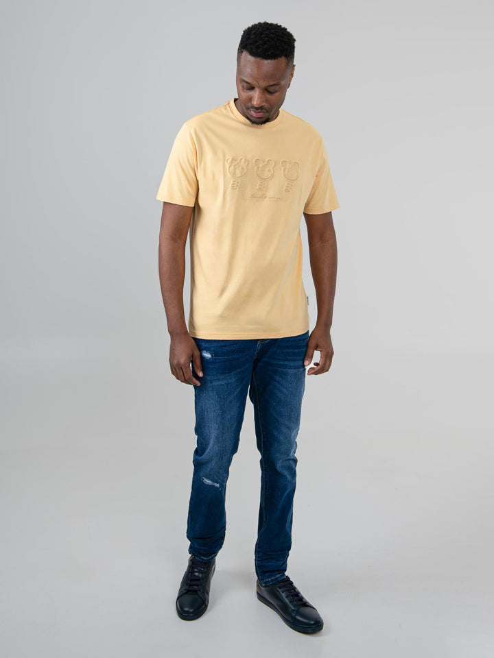 Ben Sherman Trio Embossed Bears T-shirt in New Wheat, full body front view on male model