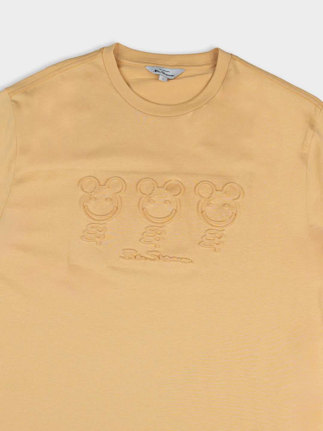 Flat lay detail view of Ben Sherman Trio Embossed Bears T-shirt in New Wheat highlighting the textured bear graphic design