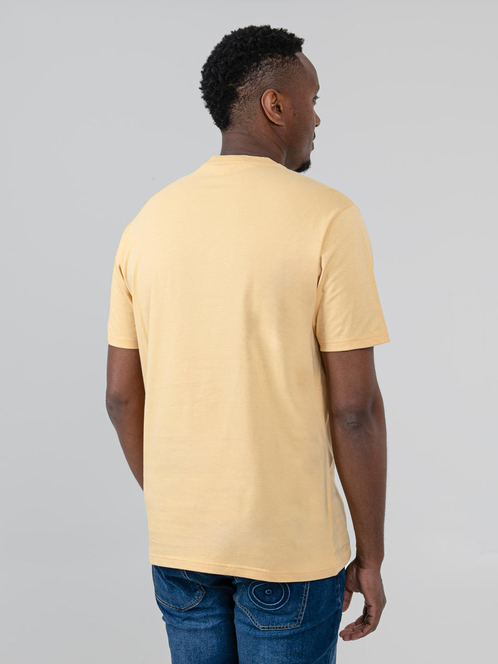 Ben Sherman Turn It Up Tee in New Wheat – back view of men's yellow cotton graphic t-shirt with relaxed fit