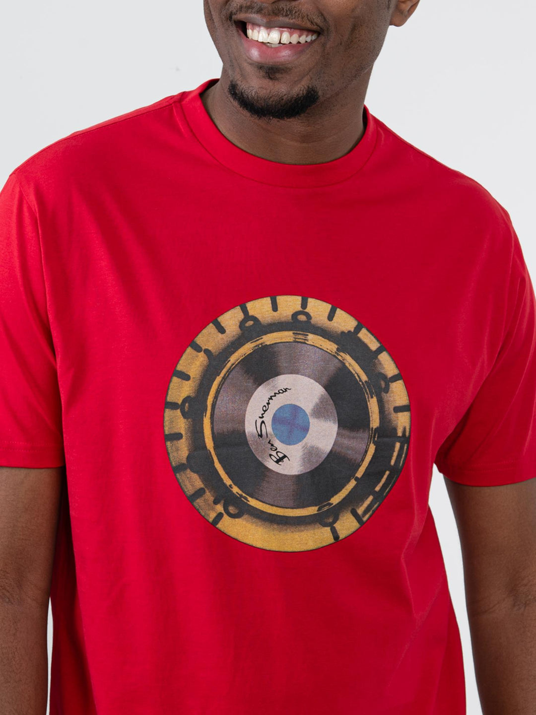 Close-up of Ben Sherman Turn It Up Tee Red – retro vinyl record graphic print detail on red cotton fabric