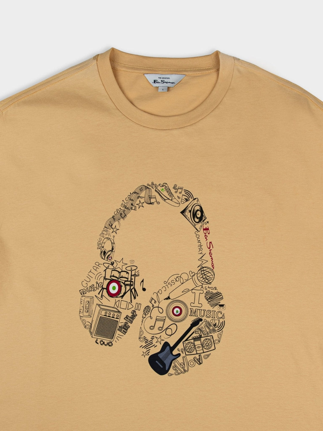 aBen Sherman Typography Headphones Tee New Wheat - overhead close-up of headphone graphic detail with music icons on wheat cotton fabric