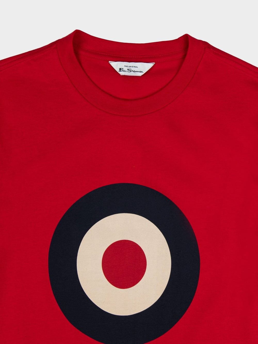 Ben Sherman Target Tee in Red - close-up of the signature target roundel print and Ben Sherman label on short-sleeve crewneck tee