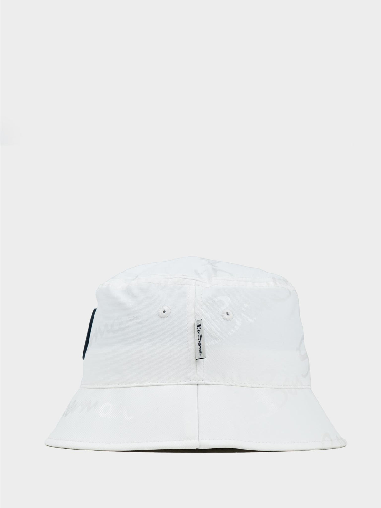 Ben Sherman reversible cotton bucket hat in White – side view showing brim shape and Ben Sherman woven label