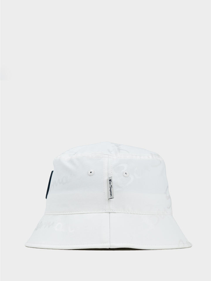Ben Sherman reversible cotton bucket hat in White – side view showing brim shape and Ben Sherman woven label